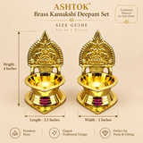 Size guide image of Brass Kamakshi Deepam set of 2 on a beige background, clearly showing the product dimensions. The image presents two polished brass deepams with measurement callouts indicating height of 4 inches, length of 2.5 inches, and width of 2 inches. The traditional lamp design includes a decorative Kamakshi-style backplate, broad oil bowl, and stable base, helping customers understand the exact size and proportions before purchase.