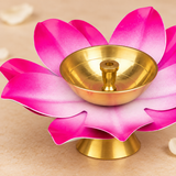 Detailed close-up image of a Brass Kamal Diya focusing on the vivid pink lotus petals, pale pink and white inner gradient, polished golden brass oil bowl, centered wick holder and smooth metallic finish, photographed on a premium beige studio background to showcase the petal texture, layered lotus construction, brass craftsmanship and decorative finish of the Akhand diya for daily puja and festive use.