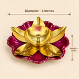 Brass lotus diya size guide showing approximately 4 inch diameter and 1 inch height, featuring a polished brass central oil bowl with wick holder, decorative golden lotus leaf petals and magenta flower shaped base, presented on a clean beige background to help customers understand the compact size suitable for puja rooms, Diwali decoration, festive lighting and gifting.