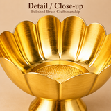Detailed close-up view of a traditional brass flower bowl highlighting its polished golden surface, curved lotus-shaped petals, smooth scalloped rim and decorative circular patterned base inside the bowl. The image showcases the reflective brass finish, individual floral petal detailing and craftsmanship of the raised pedestal design, suitable for home décor, flower offerings and festive decorative arrangements.