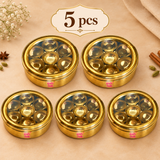 Set of 5 brass masala boxes with transparent glass lids and seven inner bowls in each box, arranged neatly on a premium beige background for gifting and bulk orders.