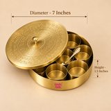 Size guide image of a brass masala dabba with lid and inner spice containers on a beige background, showing Diameter - 7 Inches and Height - 1.5 Inches.