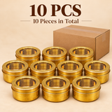 Set of 10 traditional round brass masala storage boxes featuring golden brass cylindrical bodies, removable lids and transparent circular viewing windows. The containers are neatly arranged in rows alongside a simple brown cardboard shipping box, showcasing the 10-piece quantity option suitable for bulk kitchenware purchases, traditional gifting, return gifts and household storage requirements.