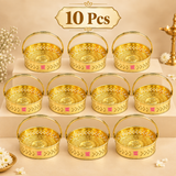 Set of 10 Brass Oval Shape Phool Butti Temple Baskets and Puja Buttis arranged in a premium beige bulk gifting display. Each golden basket features a decorative oval body, polished brass finish, curved handle, embossed Om base design, traditional cutwork detailing and ASHTOK logo, suitable for wedding return gifts, festive gifting, religious events, temple functions and family ceremonies.