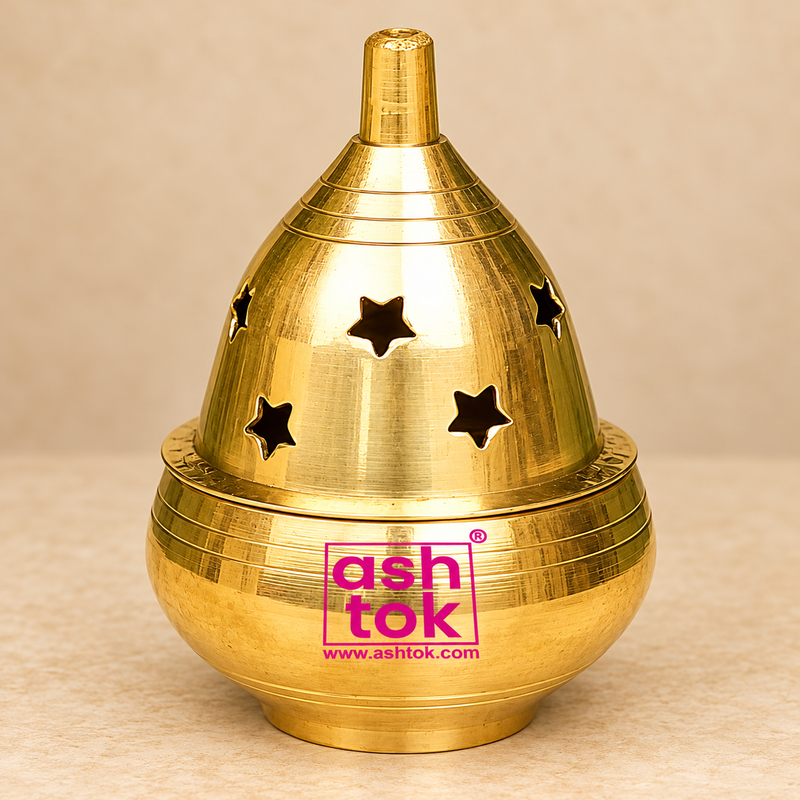 Brass Piyali Akhand Deep with a polished golden brass finish, traditional dome-shaped removable cover, decorative star-shaped ventilation cutouts, rounded brass oil bowl base, and tapered top. Beautifully designed for daily pooja, mandir worship, Diwali celebrations, religious ceremonies, and traditional home temple decoration.