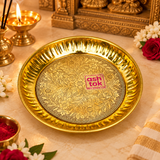 Handcrafted brass pooja thali displayed in a traditional puja setting with diya, flowers and ritual essentials, showing its use for daily worship, mandir ceremonies and festive occasions.