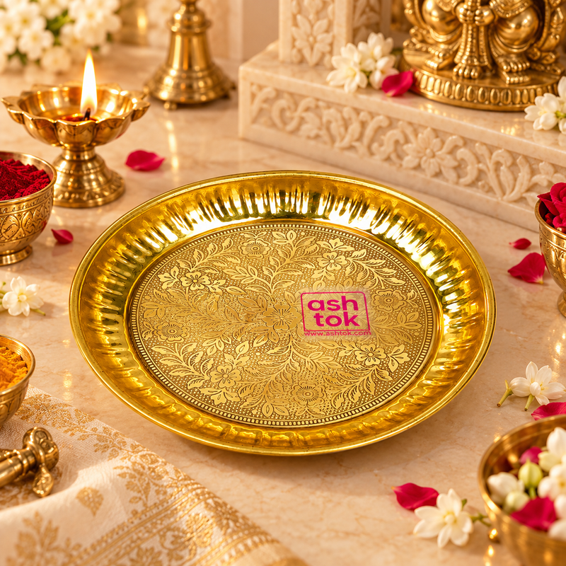 Handcrafted brass pooja thali plate displayed in a traditional puja setting with diya, flowers and ritual essentials, showing its use for daily worship, mandir ceremonies, festive pooja and religious occasions.