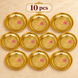 Set of 10 handcrafted brass puja plates displayed in an organized arrangement, featuring matching floral engraved centers and decorative golden rims for festive gifting and bulk orders.