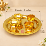 Size guide image of brass puja thali set showing 7 inch diameter and 2 inch height with measurement markings on a beige background.