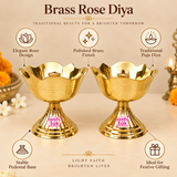 Detailed features image of two traditional Brass Rose Diyas highlighting their elegant flower-inspired design, polished golden brass finish, scalloped rose petal edges, and sturdy decorative pedestal base. Each diya features a reflective bowl with smooth curved petals, three delicate horizontal decorative lines around its exterior, and a central cylindrical wick holder designed for traditional oil lamp lighting. The fluted pedestal stand and stepped circular base complement the diya's classic appearance whi