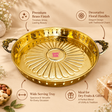 features-floral-handles.webp
Features image of a traditional round brass serving tray highlighting its premium polished brass finish, decorative floral side handles, spacious circular serving area and suitability for dry fruits and gifting. The tray features an elegant golden surface, raised perforated rim, flower-inspired radial embossed pattern on the base and detailed antique-style handles positioned on both sides for a decorative heritage appearance. Designed for serving dry fruits, sweets, chocolates, 