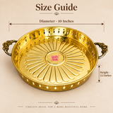 Size guide for a round brass serving tray with decorative floral side handles showing approximately 10 inches diameter and 2.5 inches height. The polished golden tray features a circular raised rim, perforated decorative side wall and an embossed radial petal pattern extending outward from the center of the base. Clear measurement arrows help customers understand the actual size and proportions before ordering.