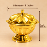 Size guide of a traditional brass sindoor box featuring a polished golden finish, decorative floral dome lid, scalloped container body and raised pedestal base. The box measures 3 inches in diameter and 2.5 inches in overall height, including the lid. The image highlights its compact dimensions and elegant design, suitable for storing sindoor, kumkum and other traditional puja essentials during wedding ceremonies, daily worship and religious occasions.