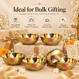 Bulk gifting image of Brass Sweet Bowl Set showing multiple brass bowls arranged with decorative gift boxes, flowers and festive styling on a beige background, suitable for return gifts, festive gifting and bulk orders.