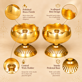 Brass Tamatar Diya product features illustration highlighting the polished golden brass finish, decorative scalloped flower-petal rim, central cylindrical wick holder, and sturdy ribbed pedestal base. The traditional rounded oil bowl features fine horizontal grooves and a smooth reflective brass interior. Designed for traditional pooja arrangements, home mandir worship, religious ceremonies, and festive decorations, this compact brass diya measures 2 inches in diameter and 2.5 inches in height.