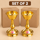 Brass Udupi Nanda Diya set of 2 displayed with simple cardboard packaging boxes on a beige background, suitable for gifting, return gifts, festive orders, and product presentation.