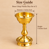 Size guide image of Brass Udupi Nanda Diya set of 2 showing one diya with dimensions marked as 3 inches diameter each and 5 inches height each on a beige background, designed to help customers understand the product size clearly.