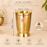 Size guide image for handcrafted brass water glass showing approximate dimensions of 3 inches diameter, 4 inches height and 400 grams weight, presented on a premium beige background with the engraved brass glass clearly visible for product reference.