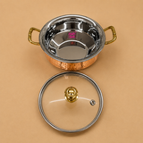 Hammered copper and stainless steel serving handi with removable glass lid and brass handles, shown open to highlight the polished stainless steel interior, ideal for serving biryani, curries, rice, and traditional Indian dishes.