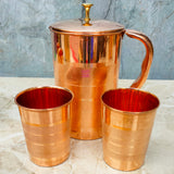 Copper water pitcher and glass set, elegant gift item for housewarming, weddings and festive occasions.