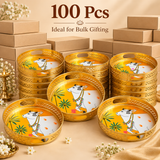 Bulk presentation of 100 Cow Design Tray Flower Baskets and Puja Trays for Temple with multiple golden trays arranged in front of plain packaging boxes. Each tray features decorative cutwork sides, side carry openings and traditional cow artwork, suitable for wholesale orders, large wedding return gift requirements, festival gifting, temple events, corporate gifting and large quantity religious gift distribution.