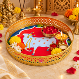 Cow Design Tray Flower Basket and Puja Tray for Temple shown in a devotional lifestyle setting suitable for puja flowers, prasad, offerings and festive use. The round tray with golden decorative cutwork edge and colorful sacred cow center artwork is presented in a warm traditional environment with visible ASHTOK logo, making it ideal for temple rituals, home mandir use, festival celebrations and auspicious gifting.