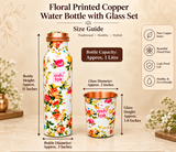 Size guide of a floral printed copper water bottle with matching drinking glass on a beige background. The bottle has an approximate capacity of 1 litre, height of 11 inches and diameter of 3 inches. The matching copper glass measures approximately 3 inches in diameter and 3.8 inches in height. Measurement arrows indicate the bottle and glass dimensions.