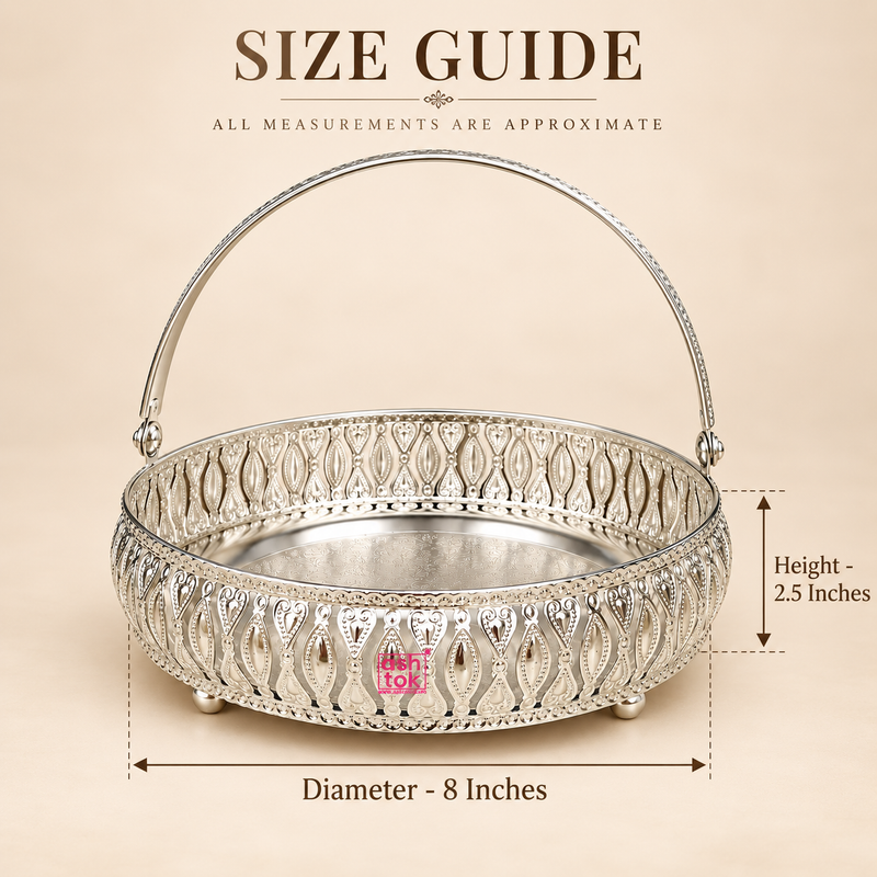German Silver Flower Butti size guide showing approximately 8 inch diameter and 2.5 inch basket height, featuring a decorative round body with detailed floral cutwork, polished silver finish, engraved base, raised feet and an arched carrying handle, presented on a beige background to help customers understand the dimensions for gifting, festive decoration, pooja use and serving purposes.