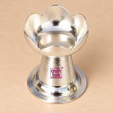 Top angle view of German Silver Puja Diya showing the open lotus shaped oil bowl, curved petal edges, smooth reflective interior and compact pedestal construction, ideal for displaying the diya design used for lighting during pooja, Diwali and other auspicious ceremonies