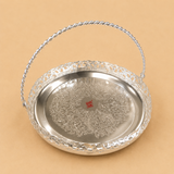 Round German Silver basket tray with twisted carry handle, engraved floral base, and decorative cutwork border for serving sweets, dry fruits, pooja, gifting, and home décor.