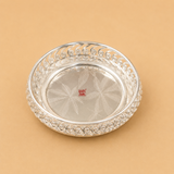 Handcrafted German Silver round serving bowl with spiral cutwork border and engraved floral base, ideal for serving sweets, dry fruits, chocolates, fruits, gifting, pooja, and home décor.