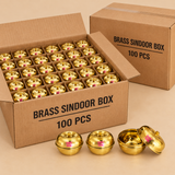 Wholesale packaging image of brass sindoor boxes in normal cardboard boxes for 100 pieces, displayed on a beige background, suitable for bulk purchase, return gift orders, festive gifting, and reseller or wholesale use.