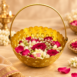 Gold coated flower gift basket with handle styled in a warm festive setting and filled with roses, jasmine and decorative flowers, demonstrating its use for flower arrangements, wedding gifting, festive hampers, return gifts, traditional ceremonies and decorative home presentation.