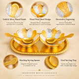 Gold and Silver Plated Dry Fruit Bowl Set features illustration highlighting the elegant two-tone metallic finish, decorative flower-petal bowl design, detailed floral engravings, matching golden serving spoons, and oval gold-plated tray with raised beaded edges. The coordinated five-piece serving arrangement includes two ornamental bowls with alternating gold and silver petals, an engraved tray, and decorative spoons, making it suitable for festive dry fruit serving, special occasion table arrangements.