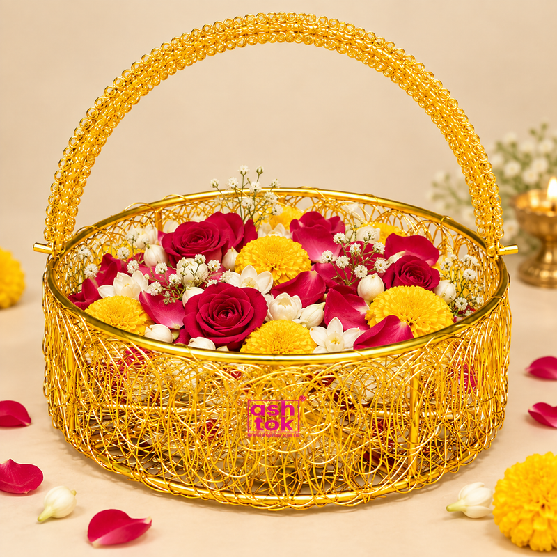 Golden metal wire flower basket filled with roses, marigolds, jasmine and decorative flower petals in an elegant festive setting, showing its use for flower arrangements, puja offerings, wedding decor, festive presentation and home decoration.
