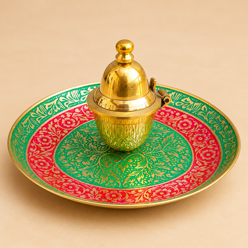 Meenakari kumkum box with matching decorative plate displayed inside an open red presentation box on a beige background