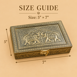 Handcrafted Elephant Design Brass Decorative Storage Box size guide showing approximately 5 inch width and 7 inch length, featuring an intricate embossed double elephant motif, traditional floral engraving, antique gold finish and secure decorative metal clasp.