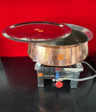 Large copper biryani handi with stainless steel lid, handcrafted cookware for dum cooking and serving.