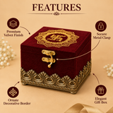 Product feature infographic highlighting key specifications of a luxury maroon velvet gift box, including four labelled callouts pointing to its premium soft-touch velvet finish on the exterior, a secure vintage-style metal latch clasp, an ornate antique gold metallic decorative border with carved scrollwork wrapping around the base, and an overall elegant gift box design for luxury presentation.