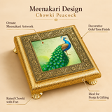 Feature image of Meenakari Design Chowki Peacock highlighting the elegant handcrafted square chowki with embossed floral border, gold-toned finish, decorative raised legs, and vibrant peacock artwork in the center, designed for festive decor, gifting, and pooja presentation.