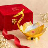 One piece Meenakari Duck Design Gift Bowl presented with a premium red gift box, featuring a golden duck-shaped body, layered gold and silver ornamental panels and detailed floral craftsmanship, suitable for return gifts, festive gifting and special occasions.