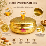 Features image of metal dryfruit gift box highlighting the crystal-style knob lid, polished golden finish, hammered texture, spacious inner storage and elegant return gift appeal, presented in a clean beige layout suitable for Shopify product pages.