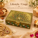 Elegant peacock design decorative storage box displayed in a festive lifestyle setting with jewellery, dry fruits and gifting accessories, ideal for storing jewellery, keepsakes, small valuables and special occasion gifts.