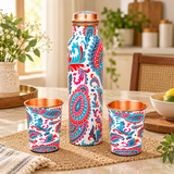 Printed copper bottle with 2 matching glasses placed in a home dining setup for everyday use