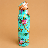 Printed copper water bottle with open lid and floral design, leak-proof Ayurvedic copper bottle for daily drinking water and home use.