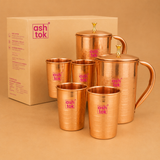 Pure copper water jug with matching glass, traditional drinkware set for healthy water storage and serving