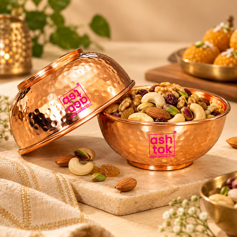 Pure copper hammered bowl styled with dry fruits and nuts in an elegant festive setting, showing its use as a serving katori for snacks, sweets, dry fruits and special occasions.