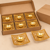 Multiple Square Shape Brass Jali Patta Diyas arranged neatly for bulk supply with simple brown corrugated cardboard packaging and divider compartments, showing the curved square brass plates, decorative floral jali cutwork, central brass oil bowls and wick holders in a practical packing setup, suitable for wholesale orders, bulk gifting, return gifts, event giveaways, festive distribution and commercial quantities without premium gift packaging.