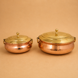 Traditional copper biryani handi with brass lid, elegant cookware for restaurants, hotels and biryani serving.