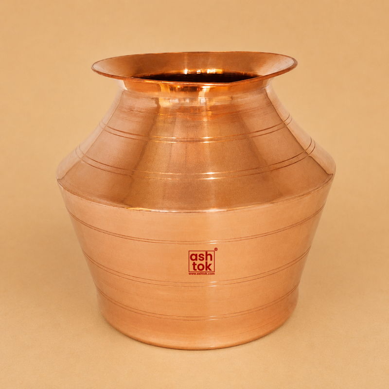Traditional pure copper water pot with a polished finish, ideal for storing drinking water, promoting Ayurvedic wellness, and enhancing home, kitchen, or pooja decor.